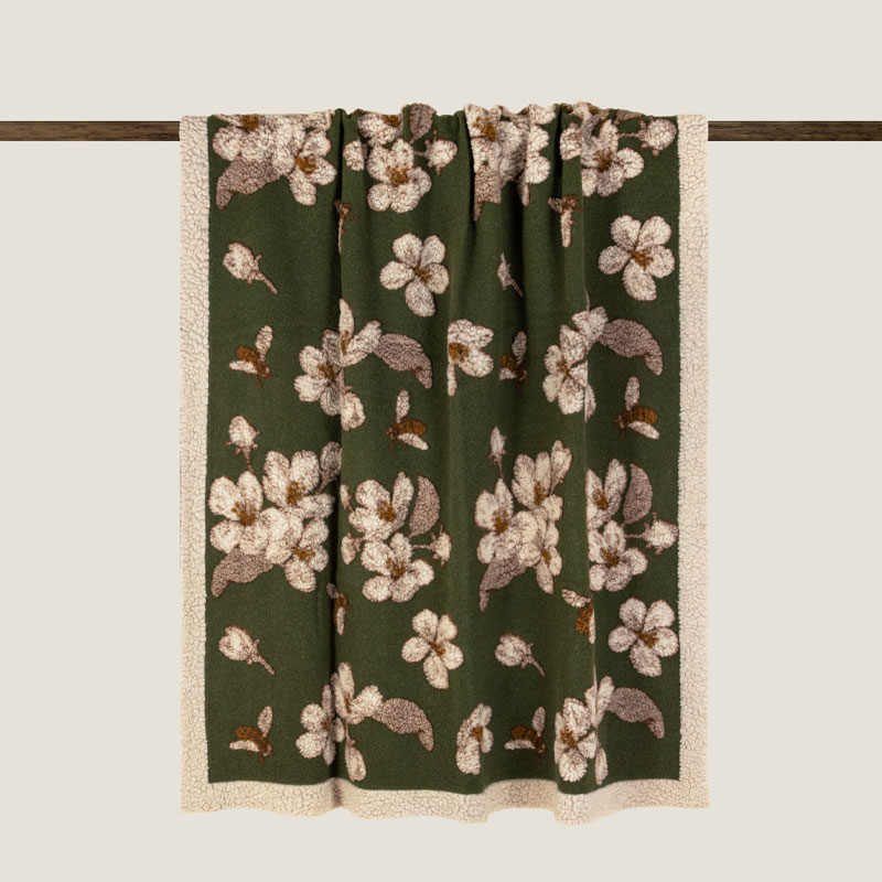 magnolia green ullpledd fra Frati Home