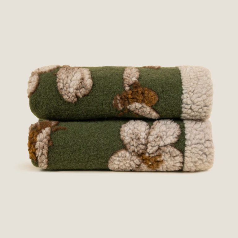 magnolia green ullpledd fra Frati Home